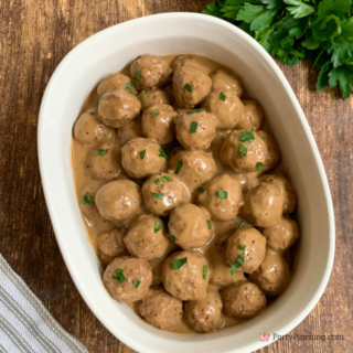 slow cooker brown gravy meatballs, 4 ingredient dinner ideas, easy frozen meatballs in crockpot, slow cooker meatballs for game day, easy potluck meatballs, best meatballs and brown gravy, gravy packet cream mushroom soup beef broth frozen meatballs, superbowl meatballs, best easy appetizer meatballs